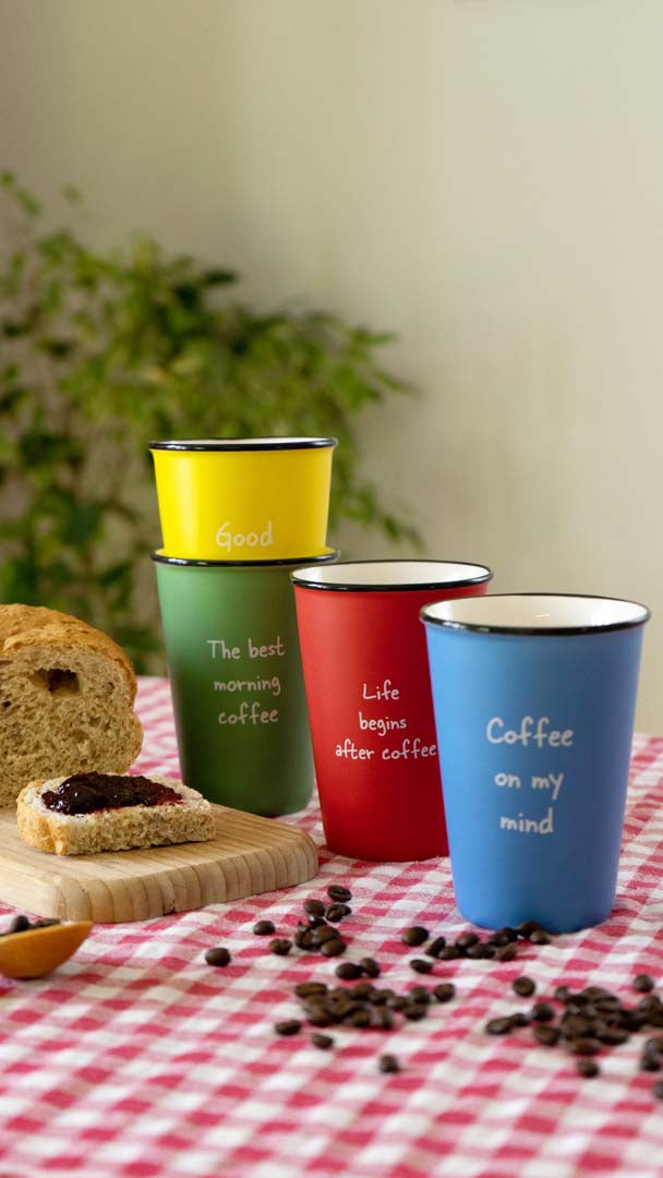 Set of 4 colored mugs with writings. Capacity 350 ml.