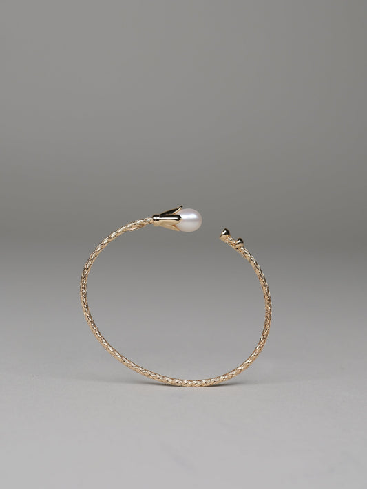Rigid bracelet with pearl
